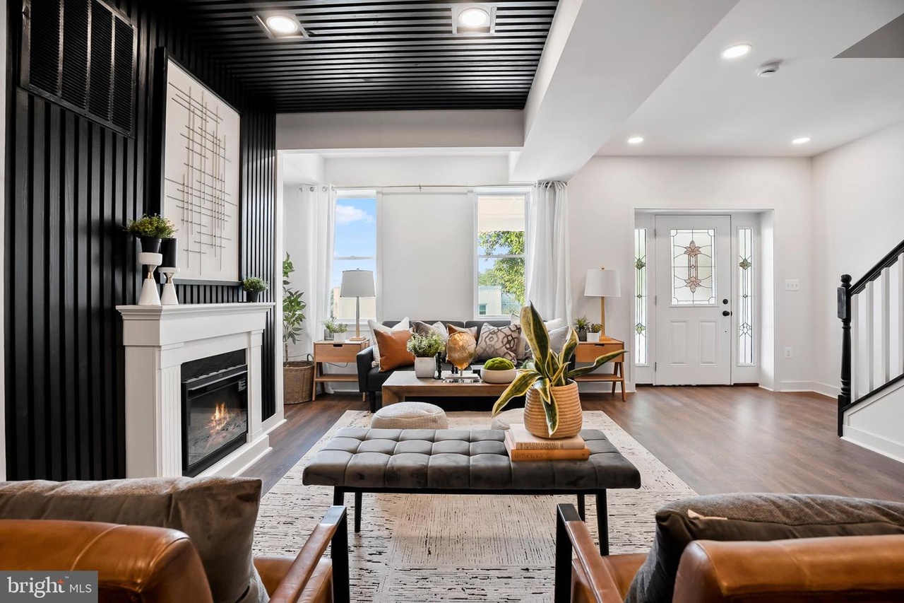 3206 Piedmont Avenue interior with fireplace and black slatted feature wall