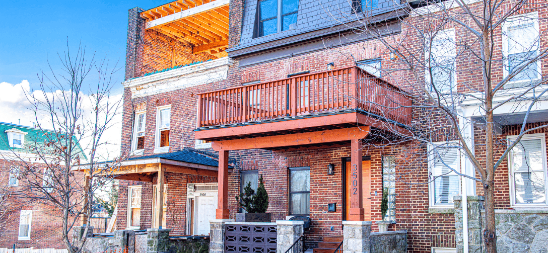 3502 Woodbrook Avenue. Brick two story rowhouse with upstairs terrace.